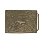 Bronze belt buckle with vintage car design on a white background