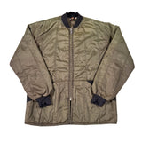 Green jacket with black cuffs on a white background