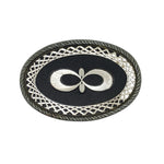 Decorative belt buckle with intricate design on a white background