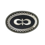 Decorative belt buckle with intricate design on a white background