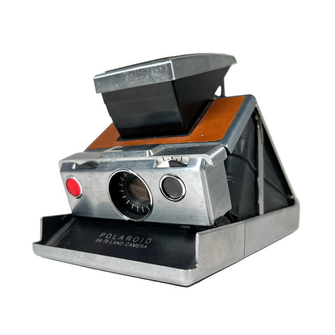 Vintage Polaroid camera on a white background