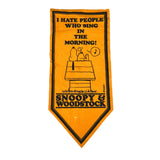 Orange sign with black text and graphics on a white background