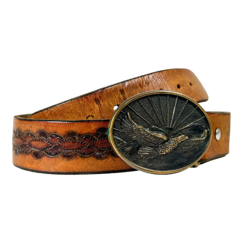 Brown leather belt with an embossed eagle buckle on a white background