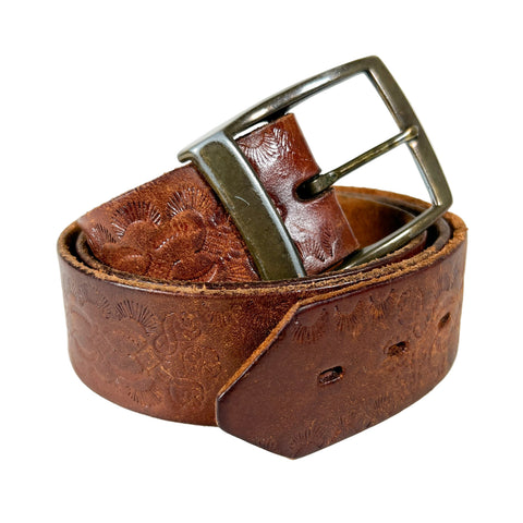 Brown leather belt with floral embossing and brass buckle on a white background