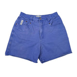 Blue denim shorts on a white background