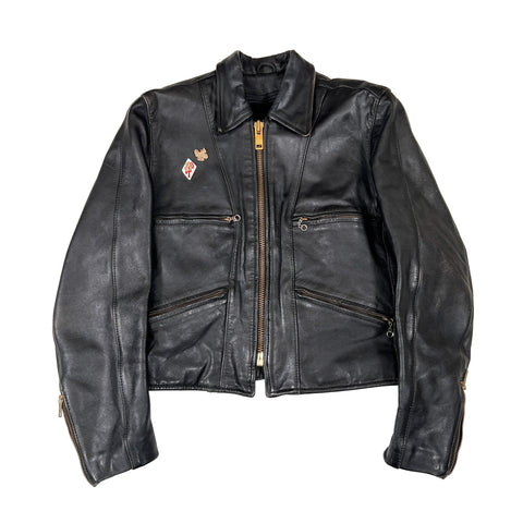 Black leather jacket with a small patch on a white background