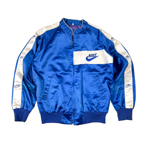 Blue and white Nike jacket on a white background