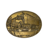 Bronze belt buckle with truck design on a white background