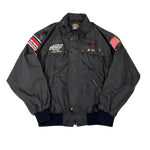 Black jacket with patches on a white background