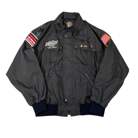Black jacket with patches on a white background