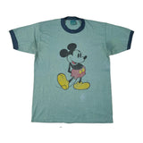 Green t-shirt with a cartoon character on a white background