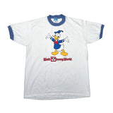 A white ringer t-shirt with blue trim on the collar and cuffs, featuring a graphic of Donald Duck and the text 'Walt Disney World.' printed on the front.
