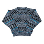 Blue and gray patterned sweater on a white background
