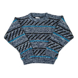 Blue and gray patterned sweater on a white background