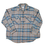 Blue and orange plaid shirt on a white background