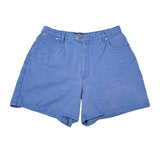 Blue denim shorts on a white background