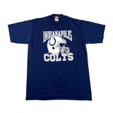 A navy blue short-sleeve t-shirt with a white graphic of the Indianapolis Colts football helmet and the words 'INDIANAPOLIS COLTS' printed on the front, laid flat on a white background.