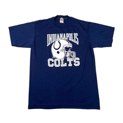 A navy blue short-sleeve t-shirt with a white graphic of the Indianapolis Colts football helmet and the words 'INDIANAPOLIS COLTS' printed on the front, laid flat on a white background.