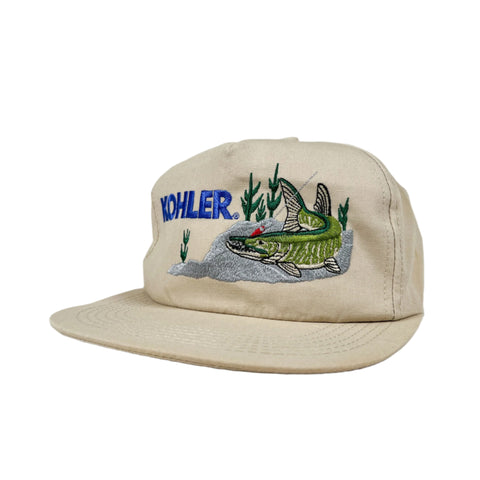 Beige cap with embroidered fish design and 'Kohler' branding on a white background