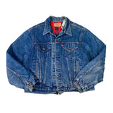 Blue denim jacket on a white background