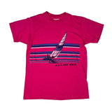 Pink t-shirt with sailboat graphic and 'N.A.S. Key West' text on a white background