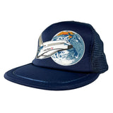 A navy blue trucker hat with a mesh back, featuring a graphic of the Earth and a United States Space Force spacecraft on the front panel.