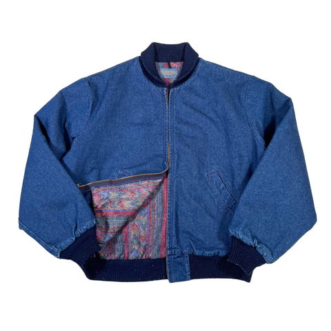 Blue jacket with patterned lining on a white background