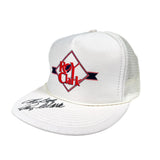 White cap with red and black logo on a white background