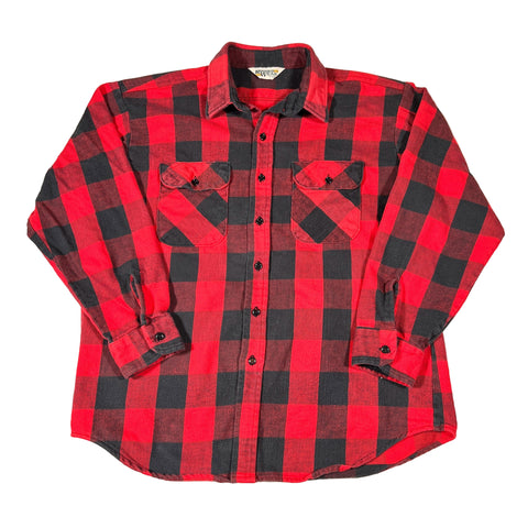 Red and black checkered shirt on a white background