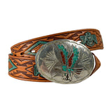 A handcrafted leather belt with intricate geometric tooling in brown and turquoise, featuring a large oval silver buckle engraved with a bird design and decorated with turquoise and red inlay.
