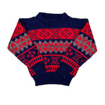 Navy and red patterned sweater on a white background