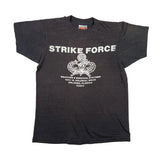 Black t-shirt with 'Strike Force' text and logo on a white background