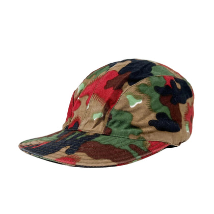 Camouflage-patterned cap on a white background