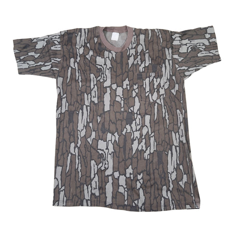 Camouflage-patterned t-shirt on a white background