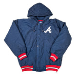 Blue snowsuit with red and white accents on a white background