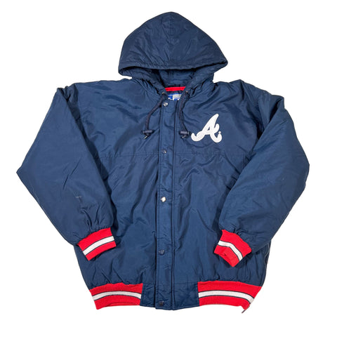 Blue snowsuit with red and white accents on a white background