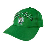 A green Boston Celtics baseball cap with 'CELTICS' embroidered in arched block letters and the team logo on the front, set against a plain light background.