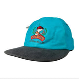 Blue and gray cap with embroidered design on a white background