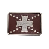 A rectangular belt buckle featuring a silver-toned cross in the center and small silver studs around the border, set against a dark reddish-brown background.
