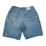 Blue denim shorts on a white background