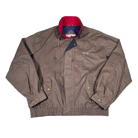 Brown jacket with a red and blue cap on a white background