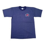 A heathered blue short-sleeve t-shirt with a crew neck, laid flat on a white surface. It features a small circular red and white graphic on the left chest that reads 'CUP HANTELAR POLO TEAM' around a polo player graphic.