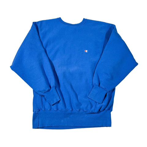 Blue shorts with a brand logo on a white background