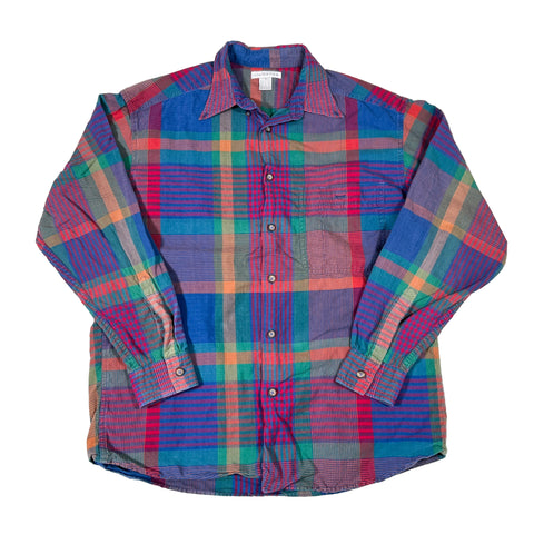 Multicolored plaid shirt on a white background