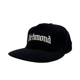 Black cap with 'Richmond' text on a white background
