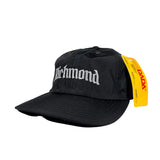 Black cap with 'Richmond' text and a yellow tag on a white background