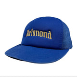 Blue cap with 'Richmond' embroidery on a white background