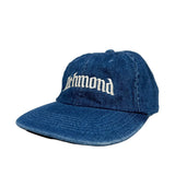 Blue denim cap with 'Richmond' embroidery on a white background