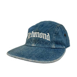 Blue denim cap with 'Richmond' embroidery on a white background