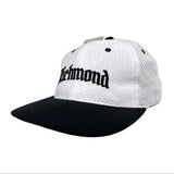 White and black cap with 'Richmond' text on a light gray background